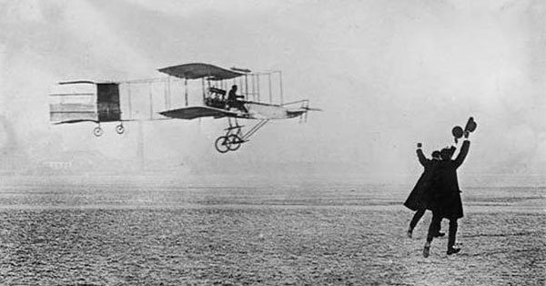 Wright brothers flying their airplane